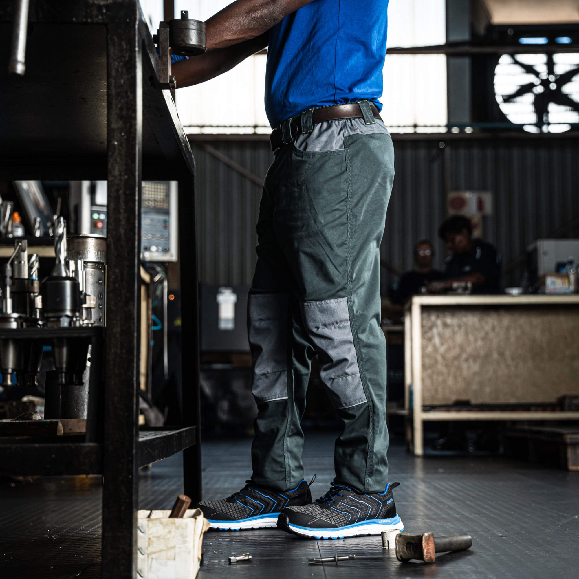 Technical-Apparel-Trousers-BASIX-Mens-Tech-Gear-Styled-Standing-Side-REBEL